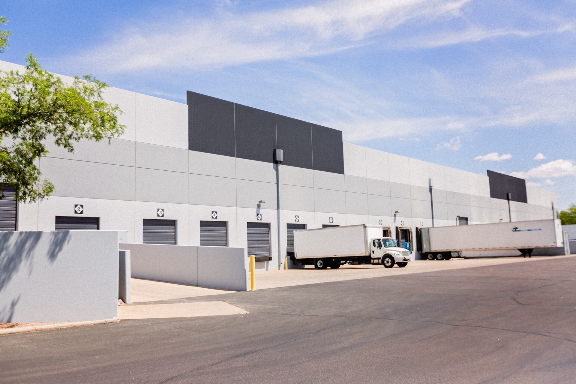 Trucks docked at the SKU Distribution fulfillment center loading bays