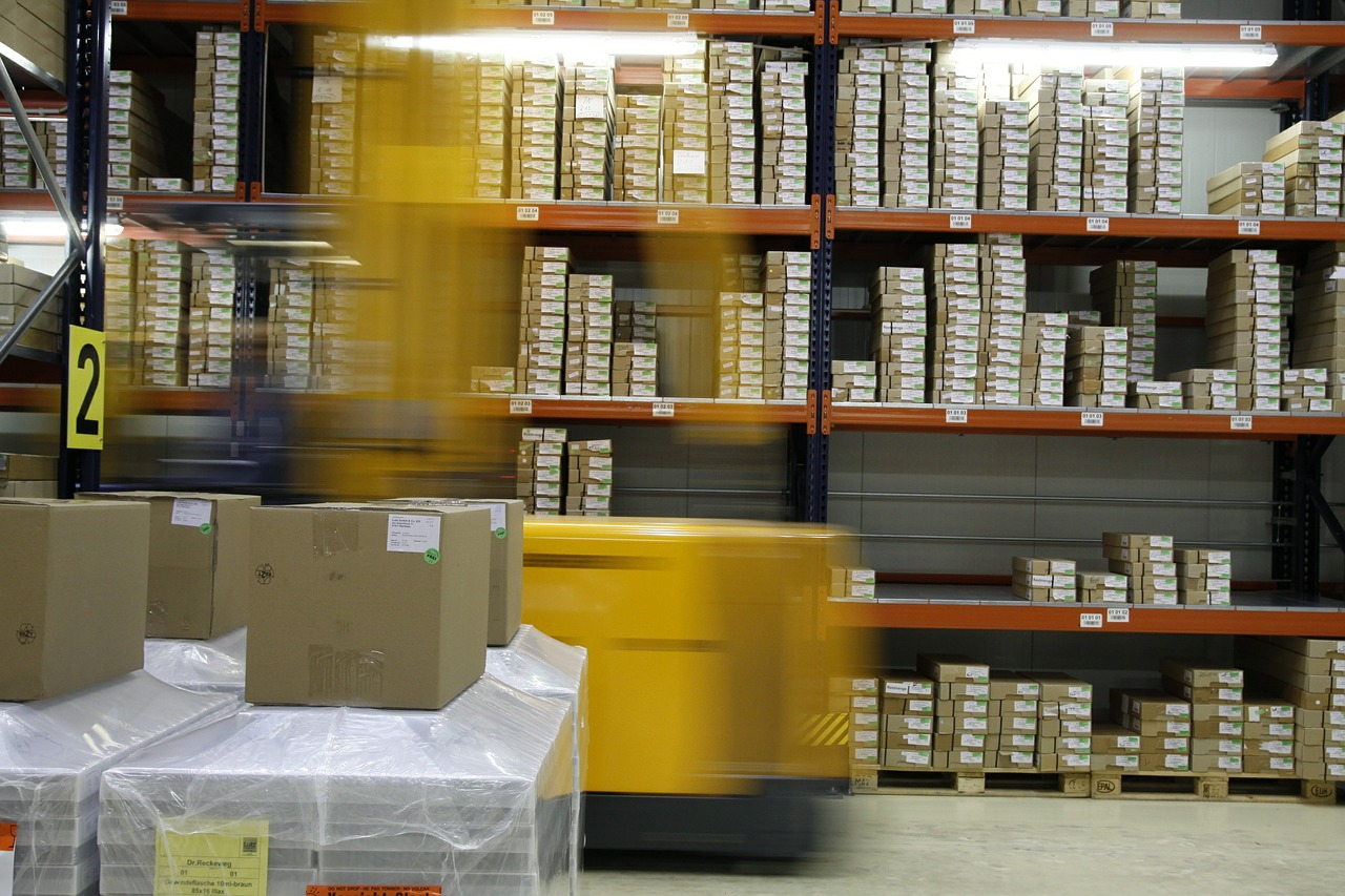Warehouse setting with boxes on the shelves of a fulfillment center